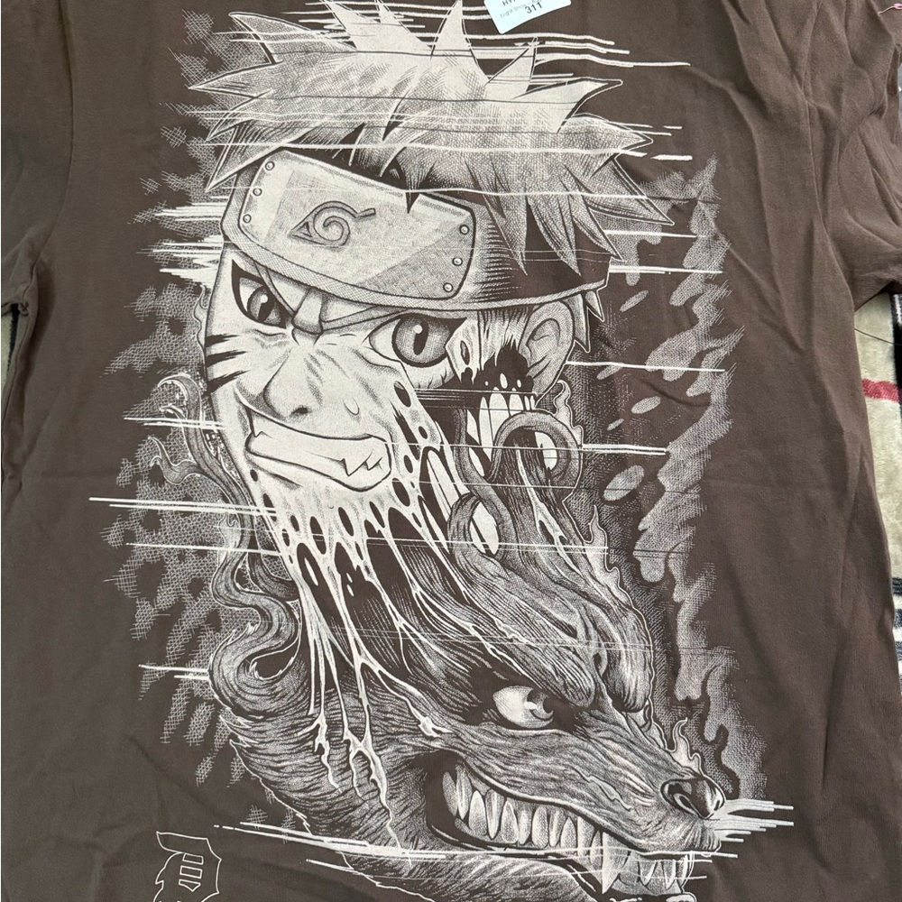 Primitive Brown Graphic Tee with Anime Design